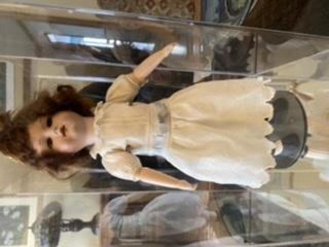 Collectable German Doll with stand and case